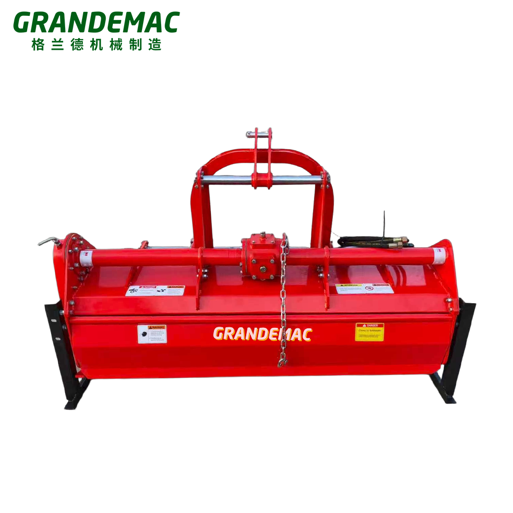 Rotary Tiller operating in an orchard row