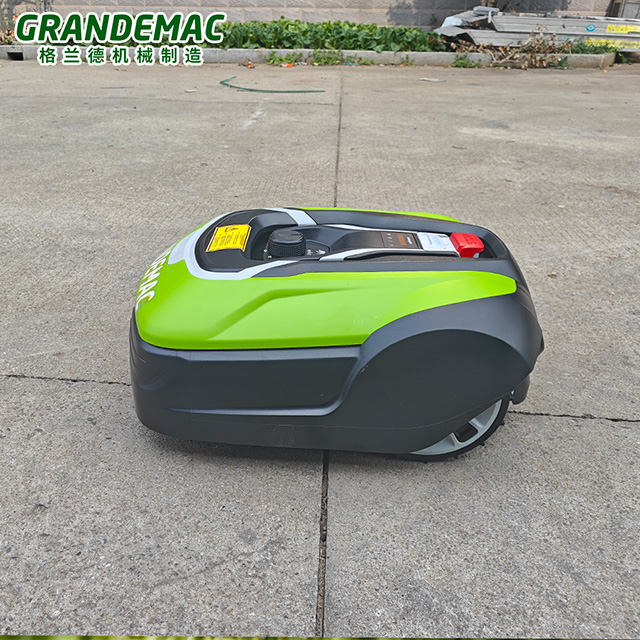 Electric robot lawn mower undergoing maintenance and winterization prep
