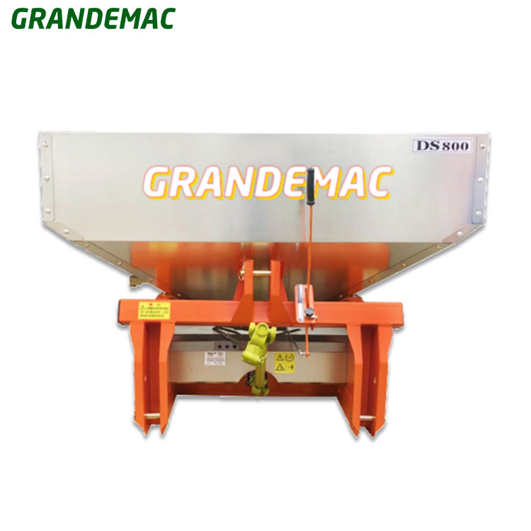 Agricultural fertilizer spreader machine in the field